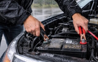 Jump car battery in rain